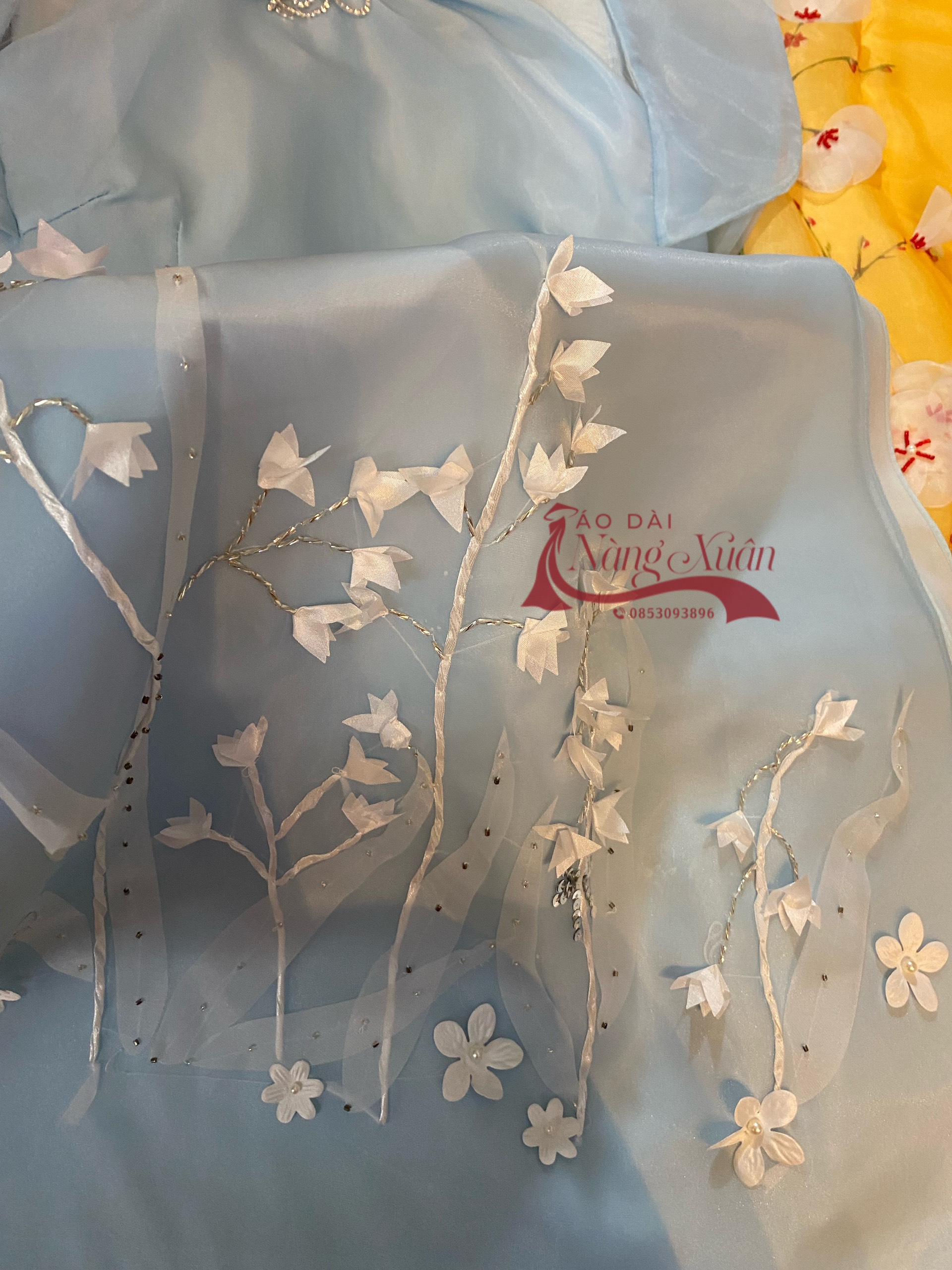 ao-dai-nu-ha-lam-mau-xanh-chat-lieu-to-ong (6)