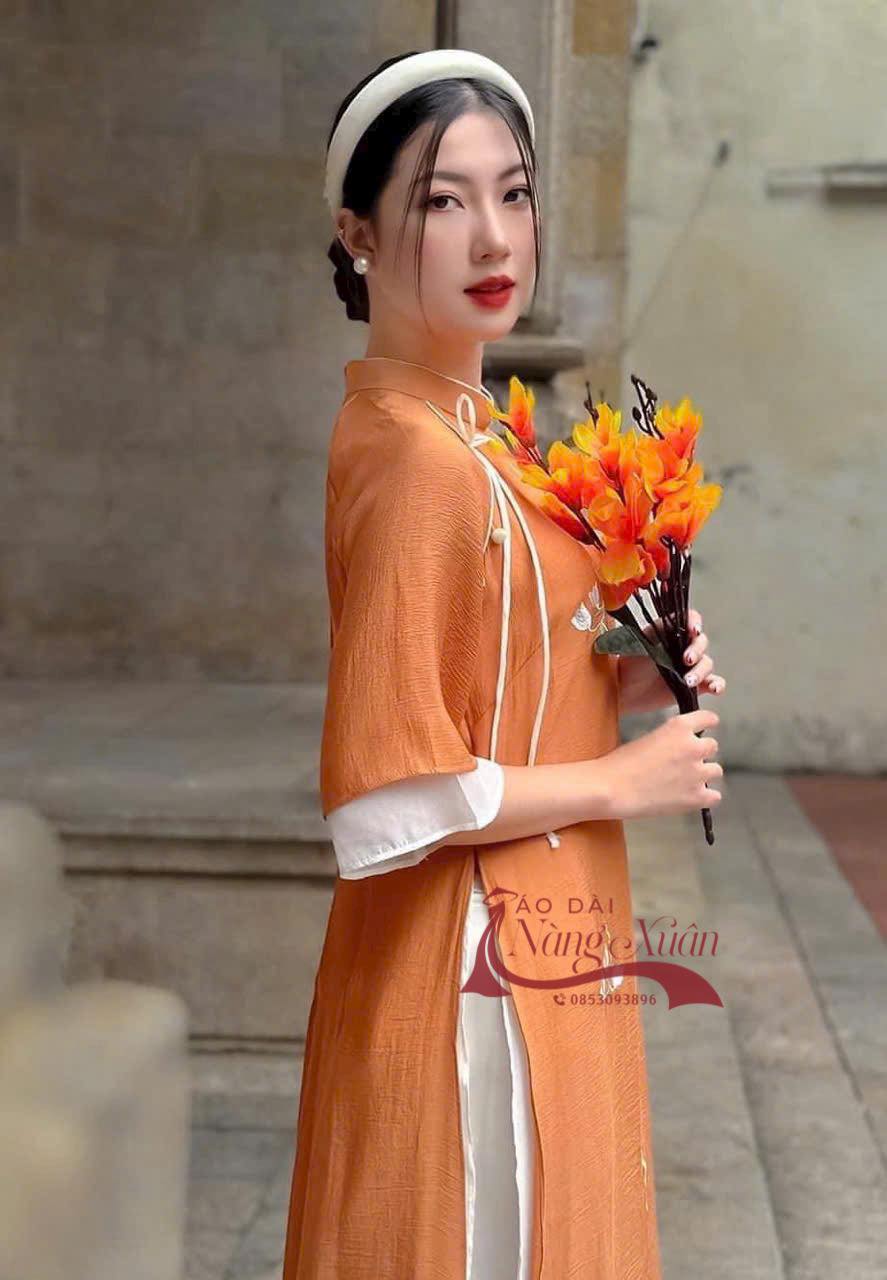 ao-dai-nu-mau-cam-chat-lieu-lua-tam (5)
