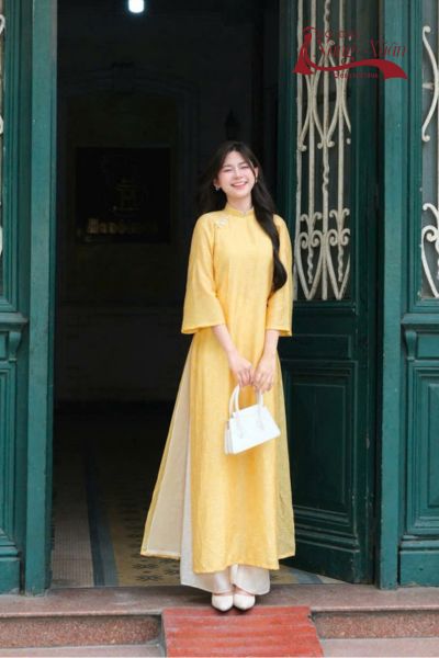 Áo dài cách tân nữ vải gấm vàng sang trọng
