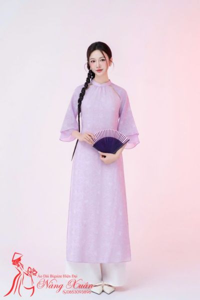 Bộ sưu tập áo dài cách tân Tết Nàng Xuân với gam đỏ và vàng phúc lộc