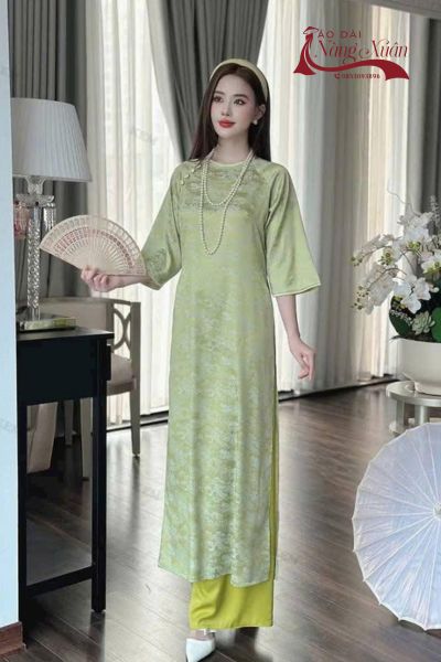 Mẫu áo dài cách tân Tết tôn dáng cho phụ nữ Việt